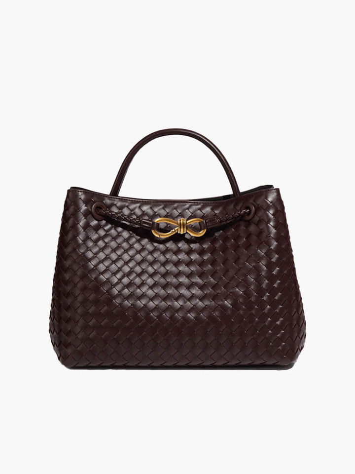 "Elegante gewebte Handtasche mit subtilem Muster, vielseitig für jeden Anlass, komfortabler Griff, stilvolle Eleganz."