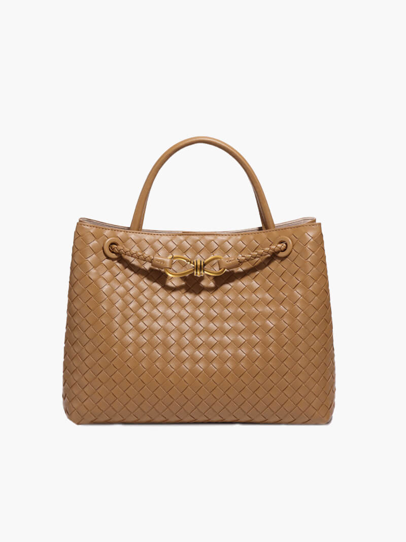 "Elegante gewebte Handtasche mit subtilem Muster, vielseitig für jeden Anlass, komfortabler Griff, stilvolle Eleganz."
