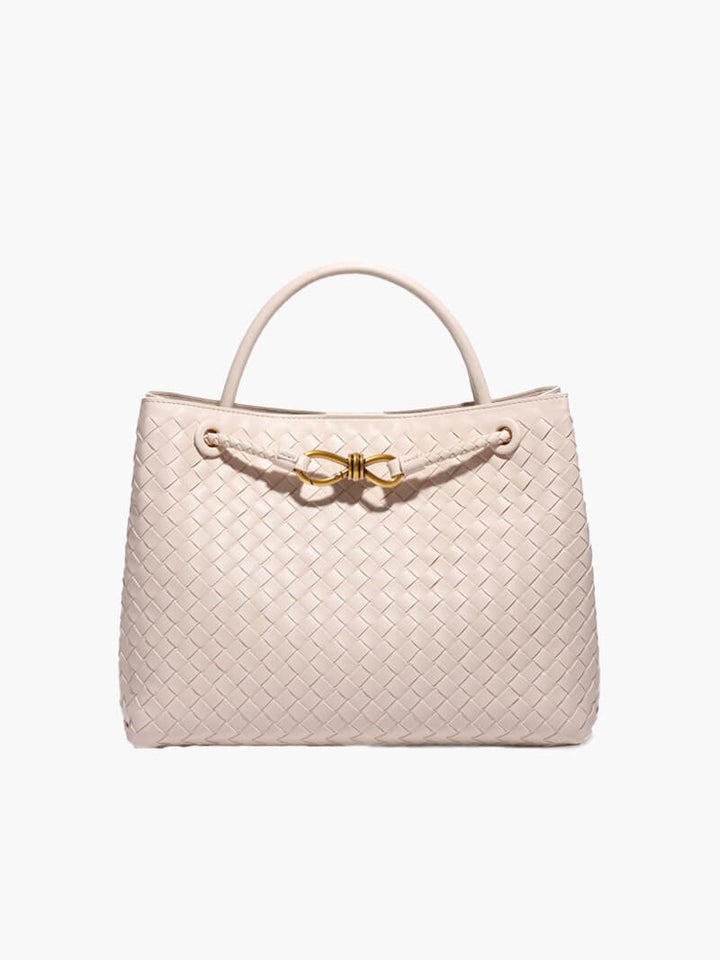 "Elegante gewebte Handtasche mit subtilem Muster, vielseitig für jeden Anlass, komfortabler Griff, stilvolle Eleganz."