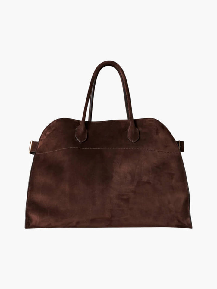 "Elegante Großraumtasche aus veganem Leder in sanftem Beige, geräumig und stilvoll für vielseitige Verwendung."