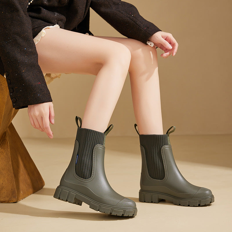 "Elegante Gummistiefel Damen, wasserdichtes Material, rutschfeste Sohle, ideal für Regenwetter, modisch und funktional."
