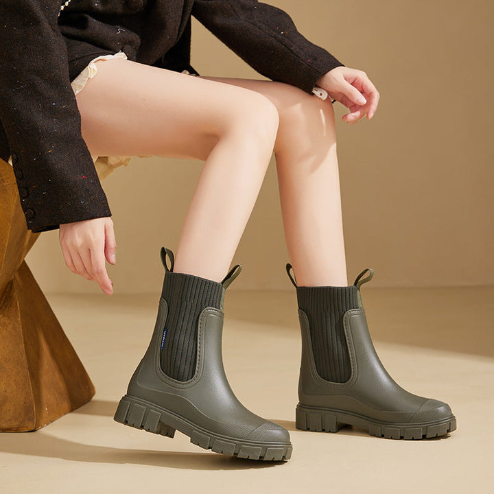 "Elegante Gummistiefel Damen, wasserdichtes Material, rutschfeste Sohle, ideal für Regenwetter, modisch und funktional."