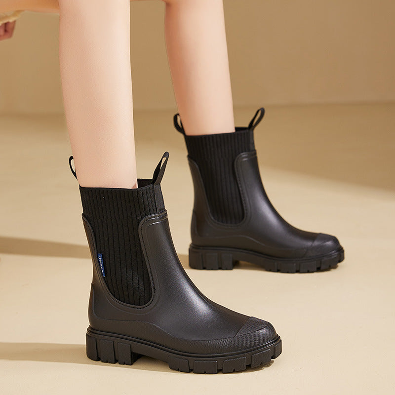 "Elegante Gummistiefel Damen, wasserdichtes Material, rutschfeste Sohle, ideal für Regenwetter, modisch und funktional."