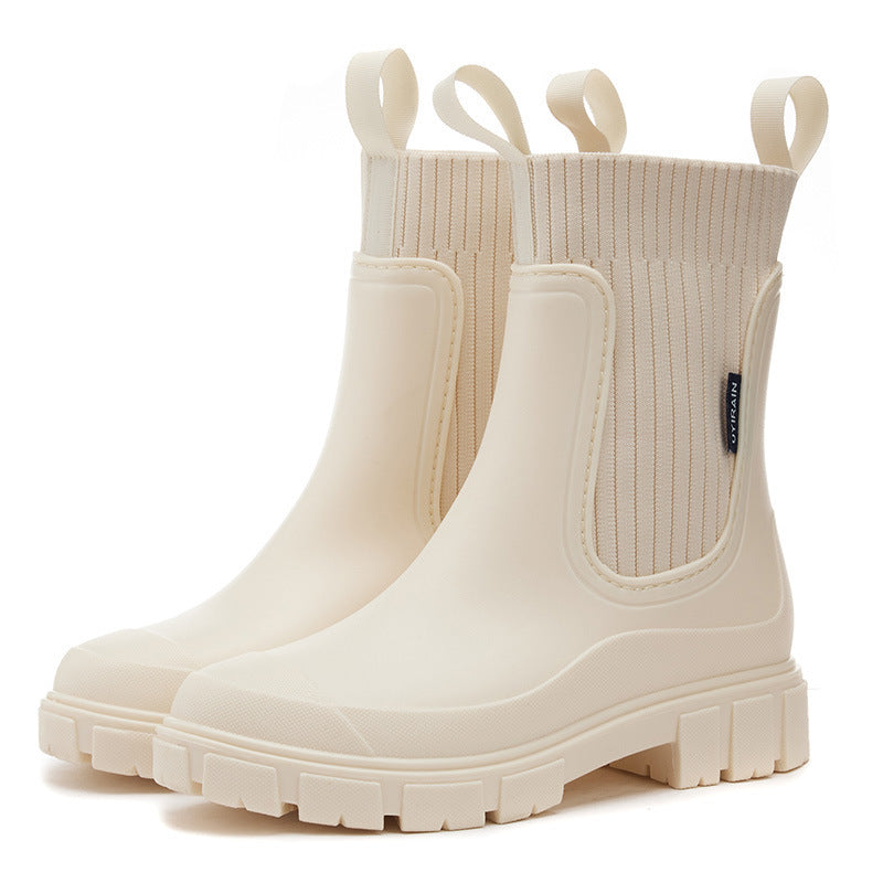 "Elegante Gummistiefel Damen, wasserdichtes Material, rutschfeste Sohle, ideal für Regenwetter, modisch und funktional."