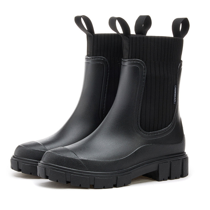 "Elegante Gummistiefel Damen, wasserdichtes Material, rutschfeste Sohle, ideal für Regenwetter, modisch und funktional."