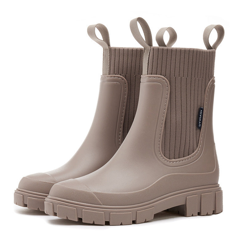 "Elegante Gummistiefel Damen, wasserdichtes Material, rutschfeste Sohle, ideal für Regenwetter, modisch und funktional."