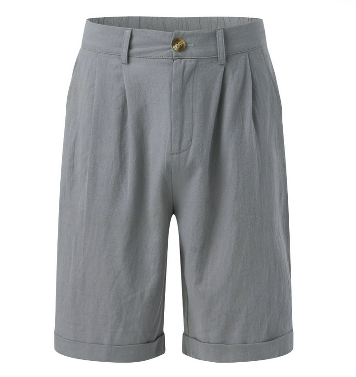 "Elegante Herrenshorts aus Baumwolle, locker geschnitten, mit Knopfleiste und Taschen, ideal für Freizeit und Büro."
