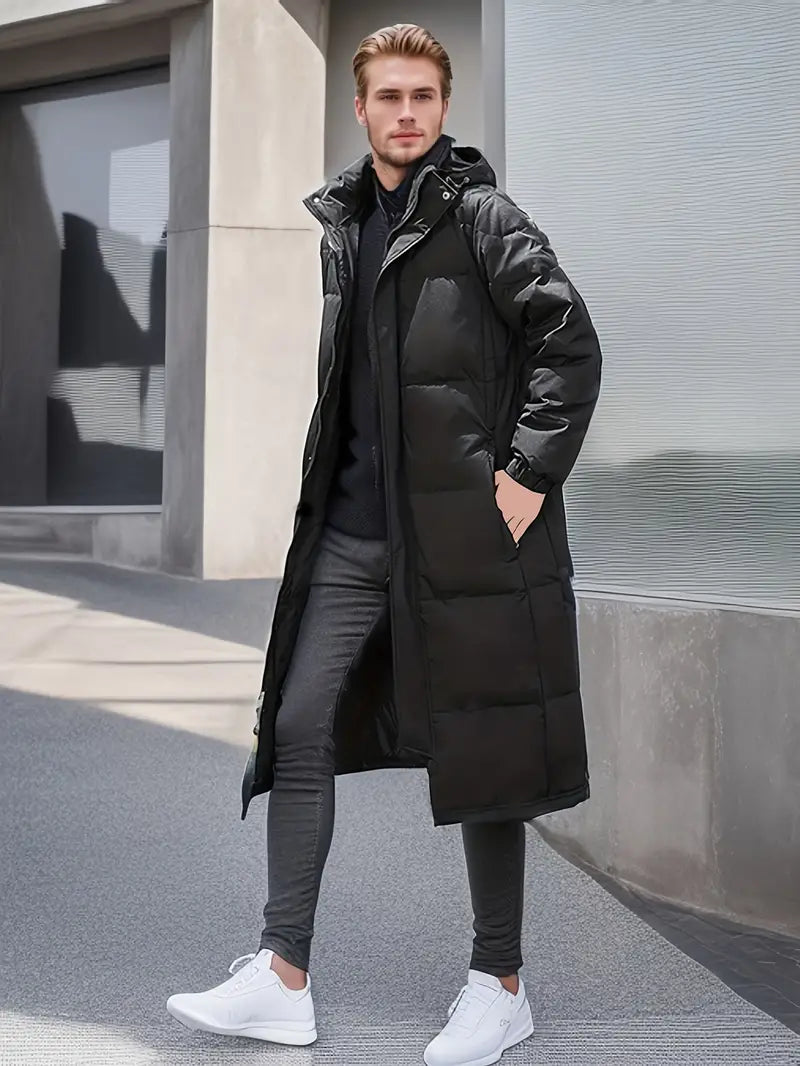 Elegante lange Herren-Winter-Steppjacke mit gestepptem Design und optimiertem Wetterschutz für kühle Tage.