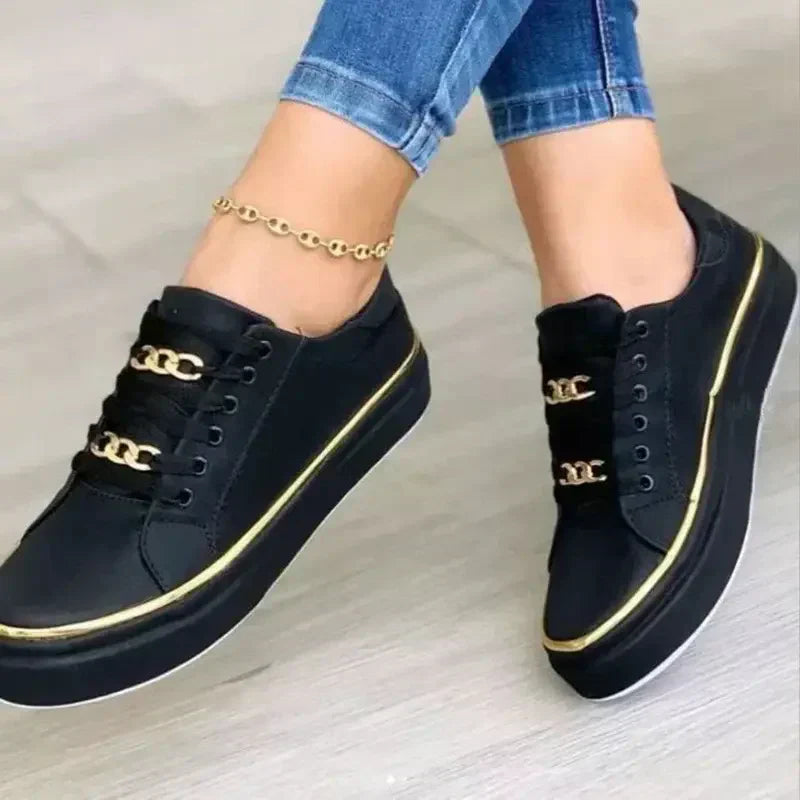 "Elegante orthopädische Damen Sneaker in Gold, Schwarz und Weiß mit runder Zehenbox und Comfort+ Sohlentechnologie."