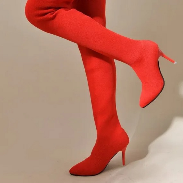 "Elegante Overknee-Stretch-Stiefel mit Stiletto-Absatz in schwarzer Seitenansicht, ideale Damenmode für trendige Looks."