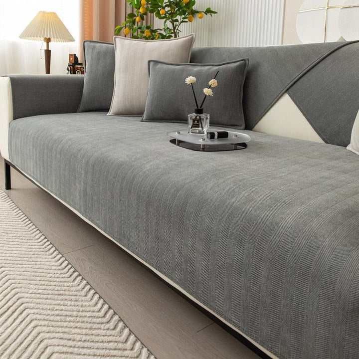 "Elegante rutschfeste Sofaschutzhülle in modernem Design, perfekt passend auf Sofa, vielseitige Farben, pflegeleicht."