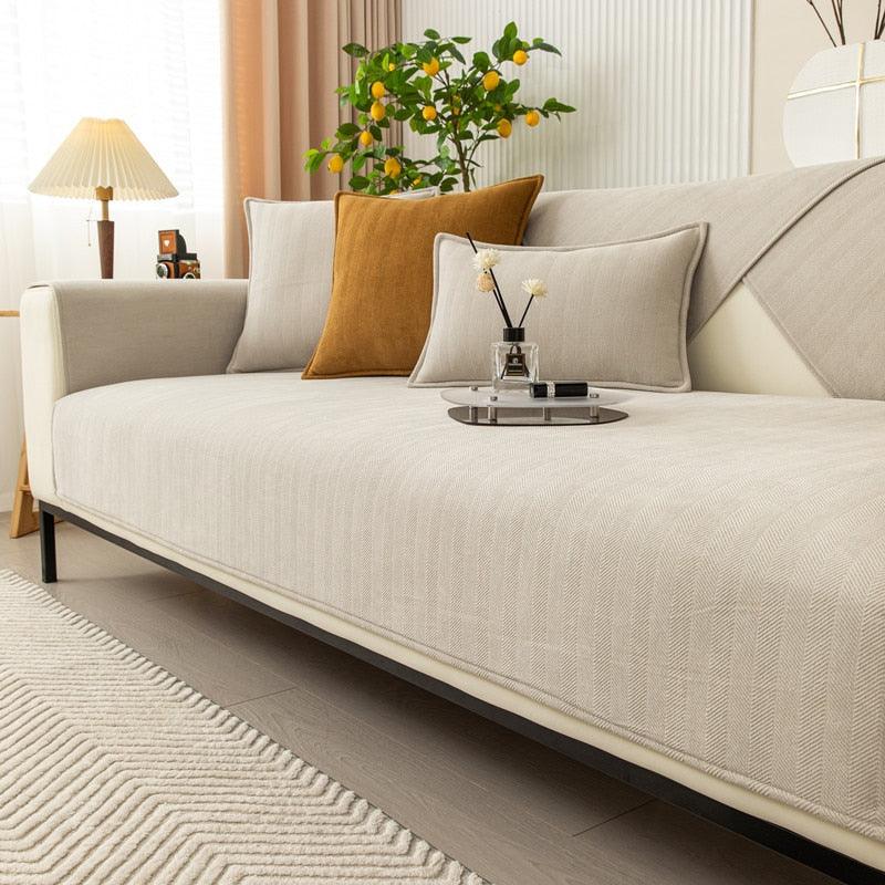 "Elegante rutschfeste Sofaschutzhülle in modernem Design, perfekt passend auf Sofa, vielseitige Farben, pflegeleicht."
