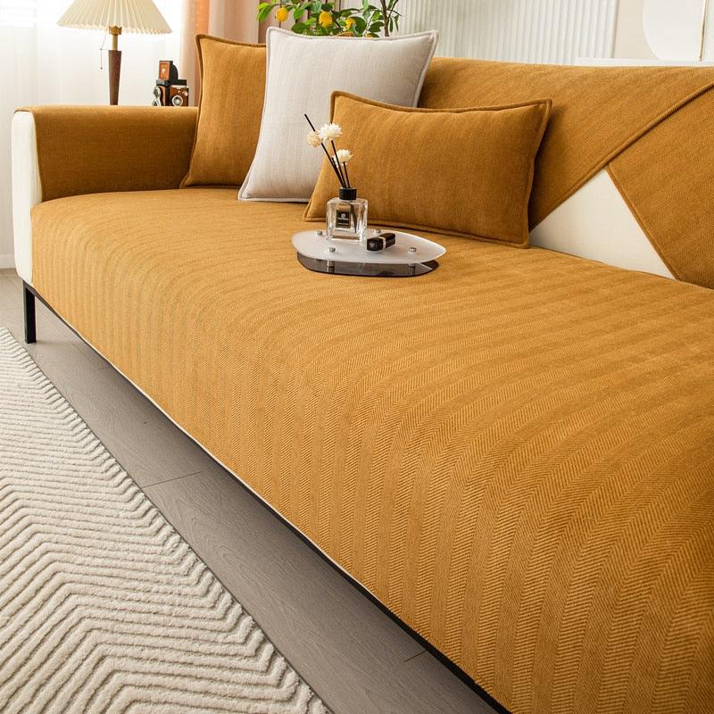 "Elegante rutschfeste Sofaschutzhülle in modernem Design, perfekt passend auf Sofa, vielseitige Farben, pflegeleicht."