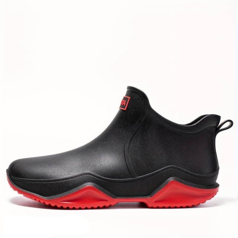 Elegante schwarze orthopädische Gummistiefel für Herren, wasserdicht, ergonomisch, ideal für Komfort und Outdoor-Aktivitäten.