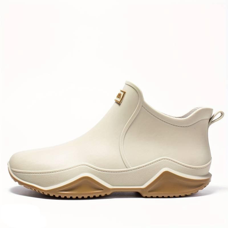 Elegante schwarze orthopädische Gummistiefel für Herren, wasserdicht, ergonomisch, ideal für Komfort und Outdoor-Aktivitäten.