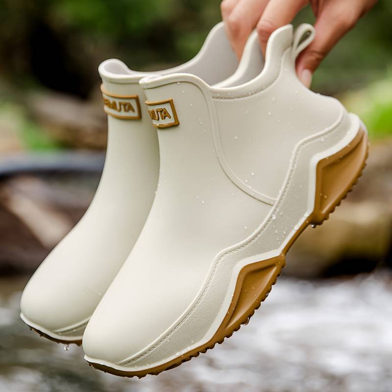Elegante schwarze orthopädische Gummistiefel für Herren, wasserdicht, ergonomisch, ideal für Komfort und Outdoor-Aktivitäten.