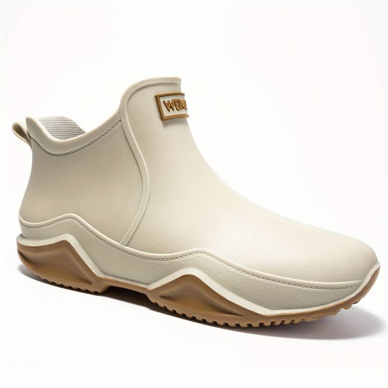 Elegante schwarze orthopädische Gummistiefel für Herren, wasserdicht, ergonomisch, ideal für Komfort und Outdoor-Aktivitäten.