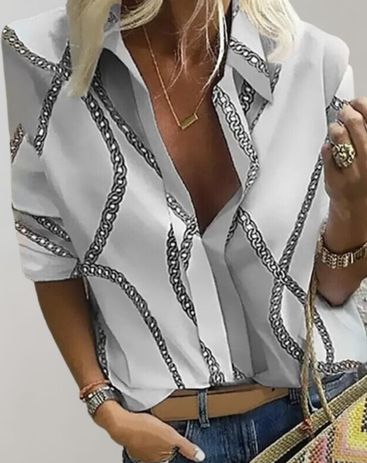 Elegante Seidenbluse mit Kettenmuster, weibliche Mode, lange Ärmel, figurbetonte Passform, vielseitig tragbar für Damen.