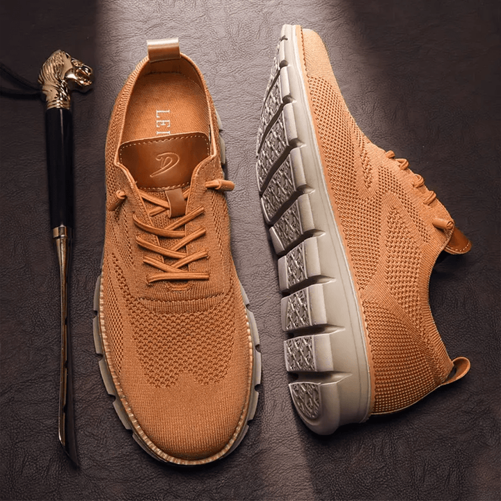 "Elegante und atmungsaktive Herrenschuhe vor weißem Hintergrund, perfekt für vielseitige Anlässe und stilvollen Komfort."