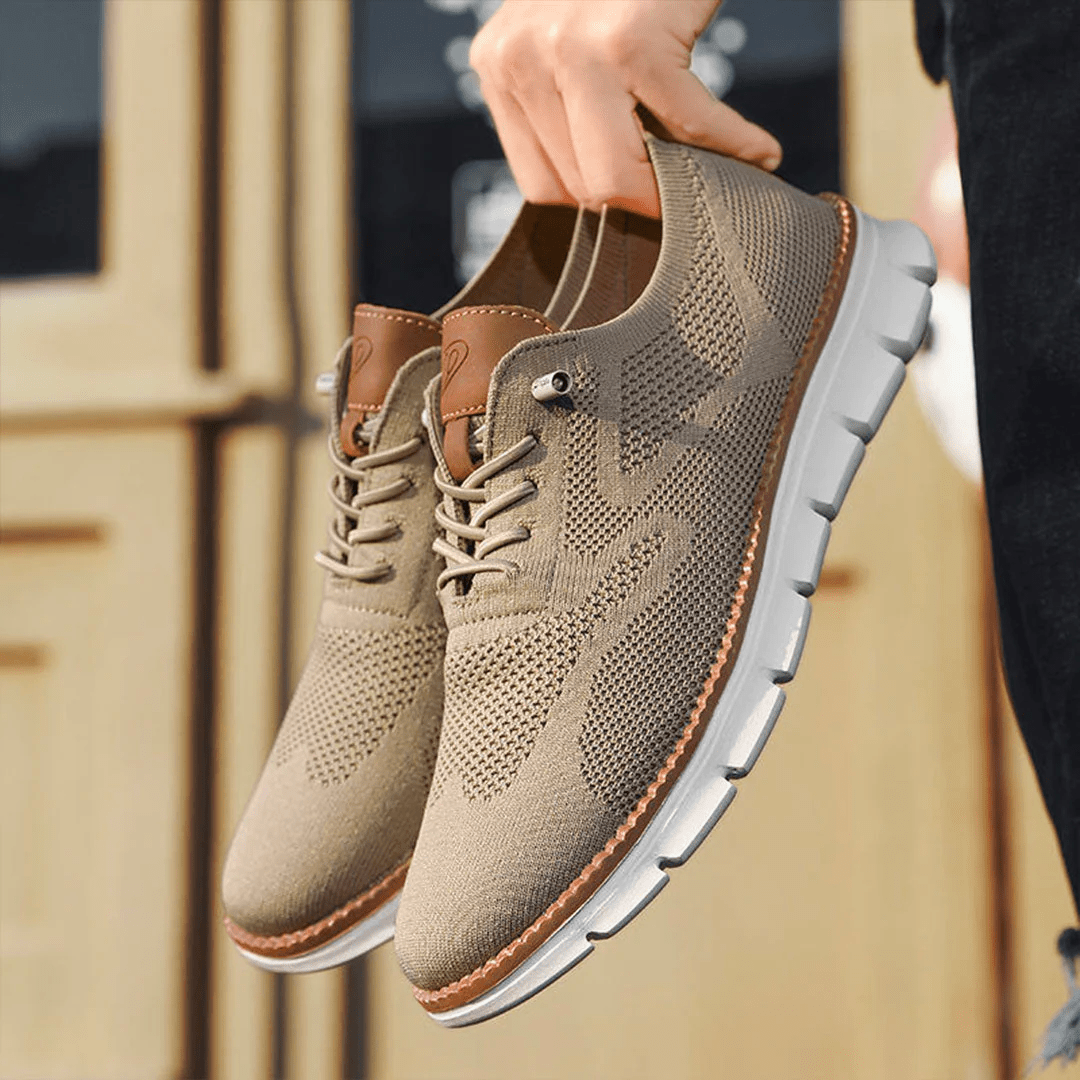 "Elegante und atmungsaktive Herrenschuhe vor weißem Hintergrund, perfekt für vielseitige Anlässe und stilvollen Komfort."