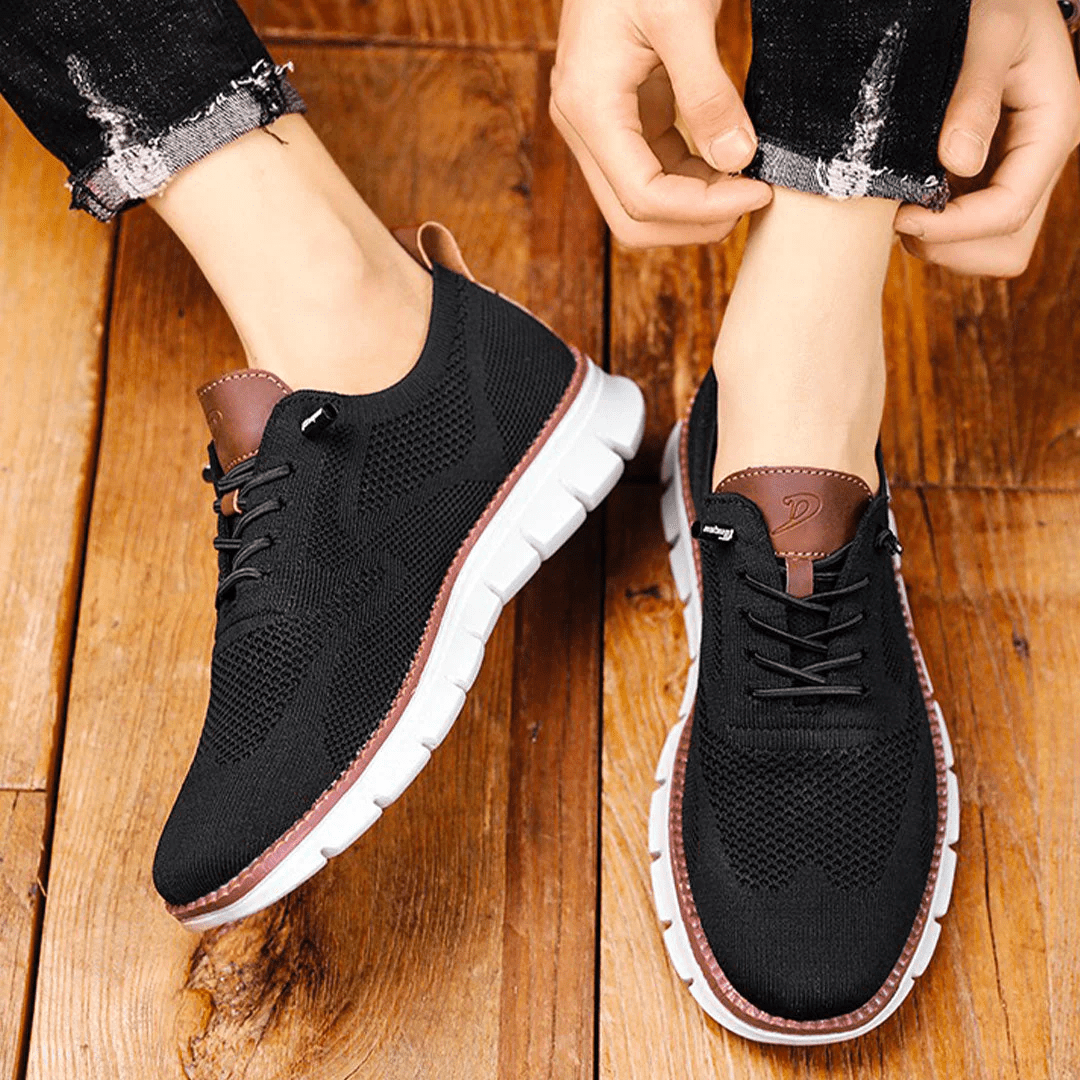"Elegante und atmungsaktive Herrenschuhe vor weißem Hintergrund, perfekt für vielseitige Anlässe und stilvollen Komfort."