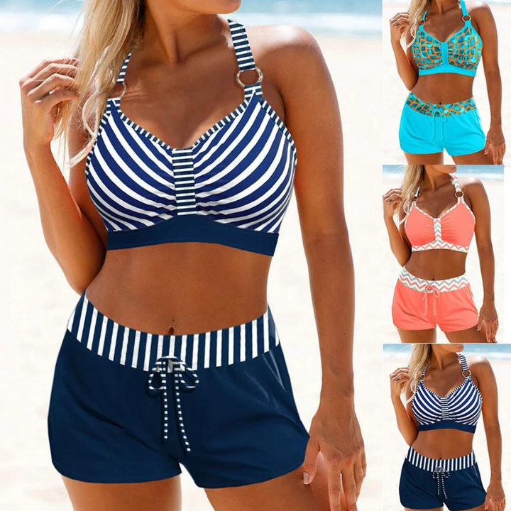 Eleganter Damen-Bikini, lebhaftes Oberteil, schlichte Unterteile, komfortable Passform, ideal für den Strand.