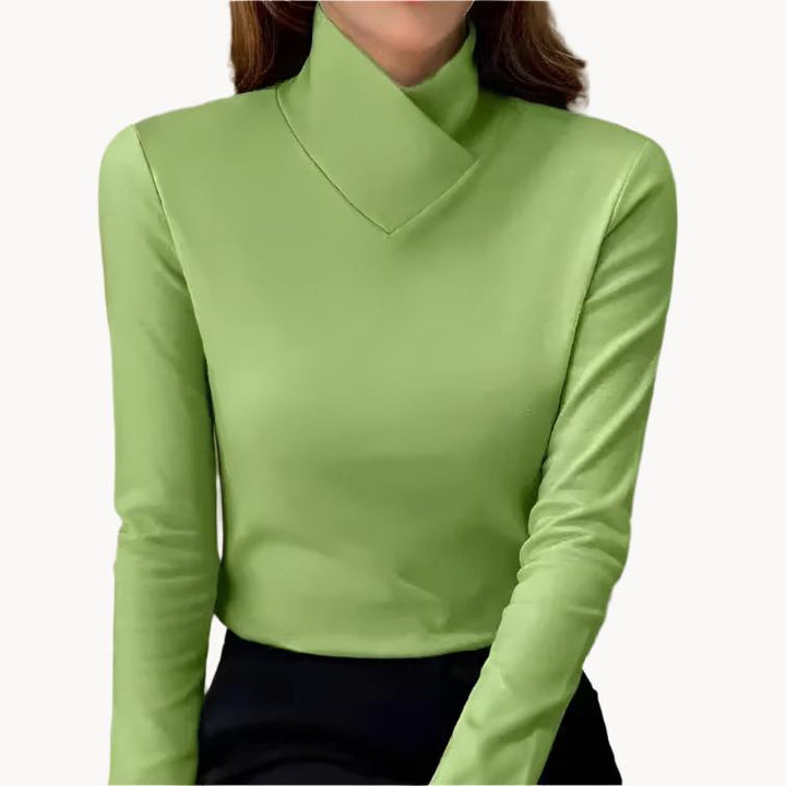 Eleganter Damen Rollkragenpullover aus weicher Wolle, grau, figurschmeichelnd, ideal für kalte Tage, vielseitig kombinierbar.
