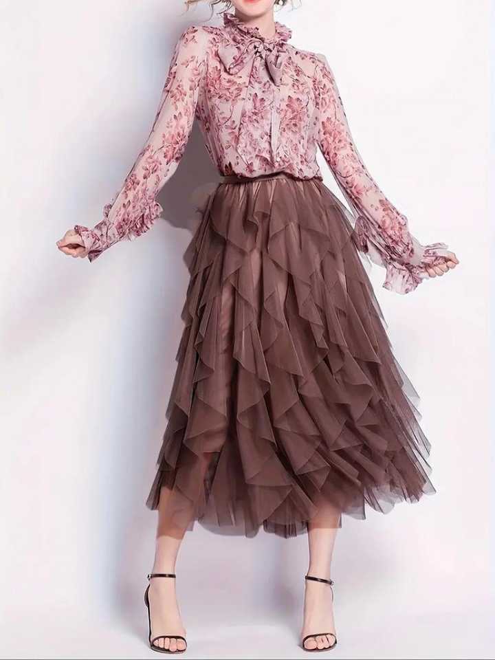 Eleganter Damen-Rüschenrock aus fließendem Tüllstoff, feminin mit Rüschen, ideal für festliche und lässige Anlässe.