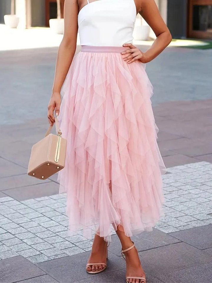 Eleganter Damen-Rüschenrock aus fließendem Tüllstoff, feminin mit Rüschen, ideal für festliche und lässige Anlässe.