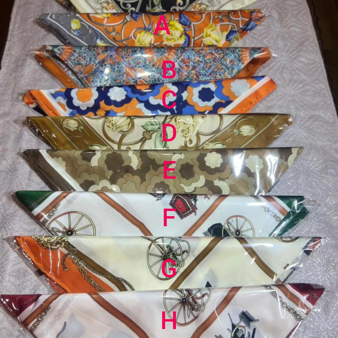 "Eleganter Damen-Seidenschal 70x70 cm in Quadratform, sanfter Glanz, vielseitig als Hals- oder Haaraccessoire tragbar."