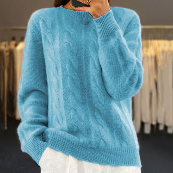Eleganter Damen Strickpullover in Creme, wärmend, gestricktes Muster, ideal für Wintertage, kombiniert Stil und Komfort.