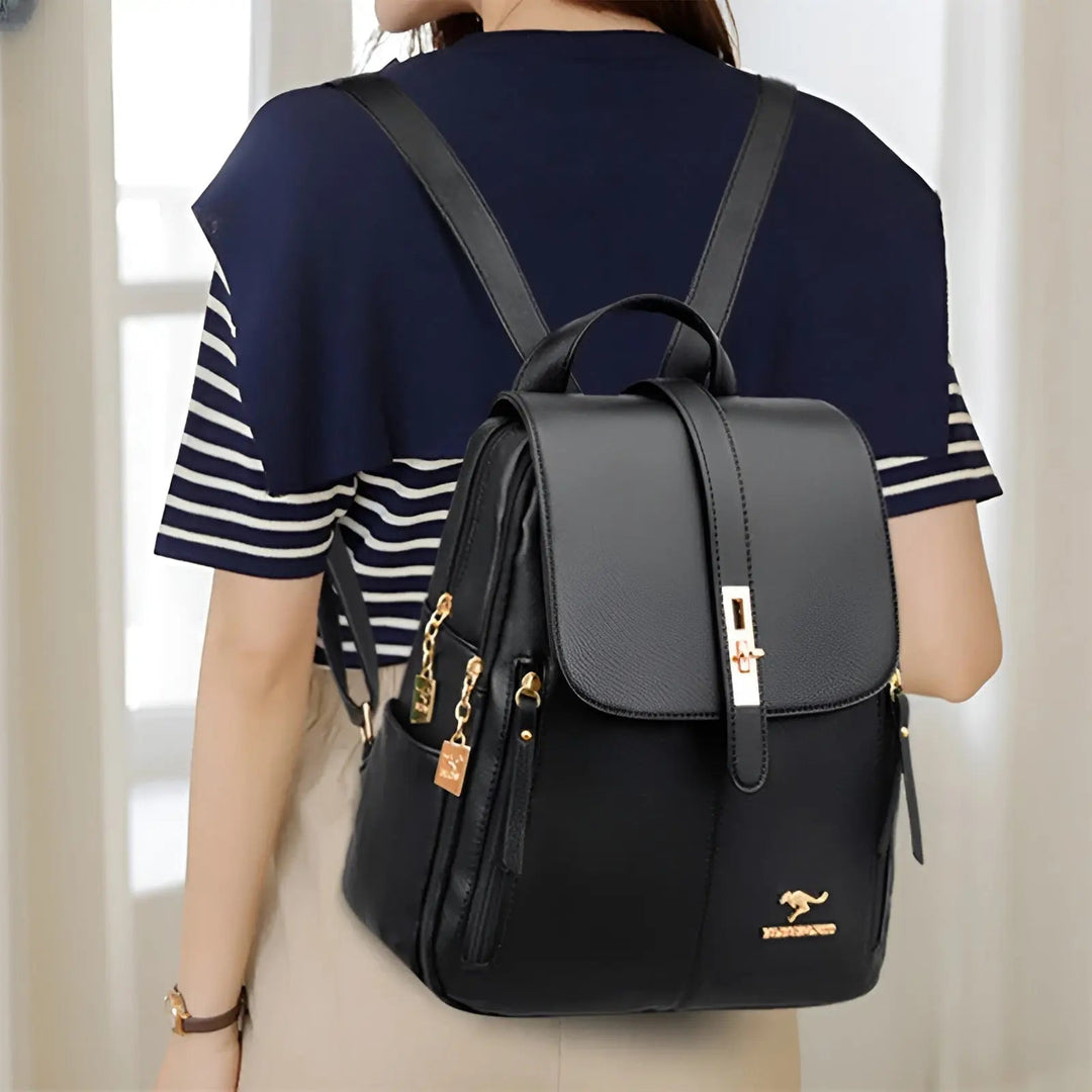 Eleganter Damenrucksack aus wasserabweisendem Leder, mit mehreren Fächern, in Burgunderrot, Dunkelblau, Schwarz, Weiß.