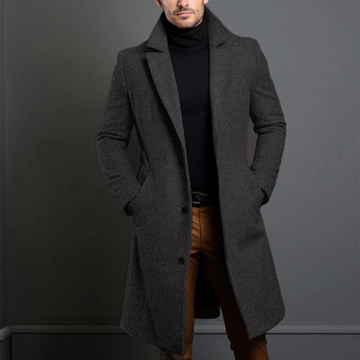 Eleganter Herren-Wollmantel in Anthrazit, klassisches Design, wärmend und wetterfest, perfekte Wahl für kalte Tage.