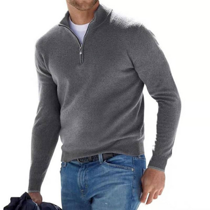 "Eleganter Herrenpullover mit Merino V-Ausschnitt und Reißverschluss; klassische Form, atmungsaktive Synthetik-Wolle."