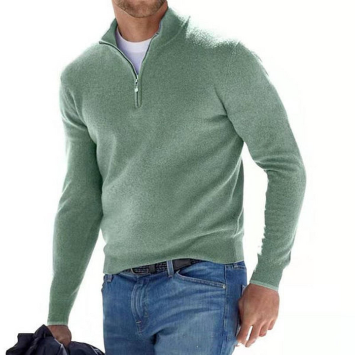"Eleganter Herrenpullover mit Merino V-Ausschnitt und Reißverschluss; klassische Form, atmungsaktive Synthetik-Wolle."