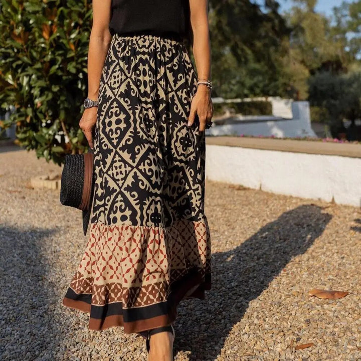 "Eleganter Maxi-Sommerrock für Damen, hohe Taille, fließendes Design, lebendige Farben, betont die Silhouette."