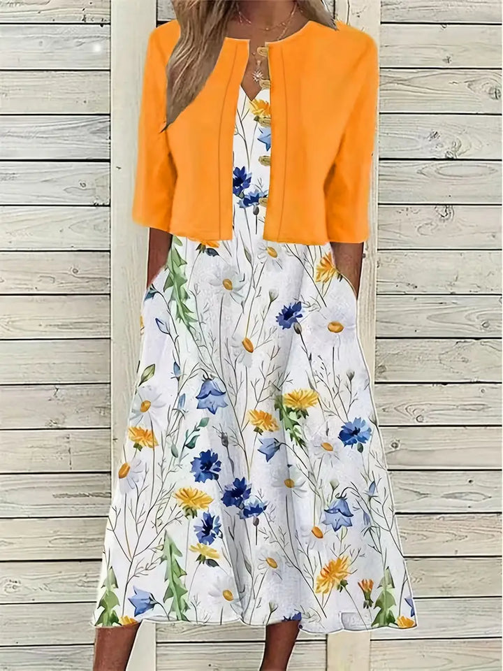 Elegantes Blumen-Set für Frauen: Blumiges Kleid und schlichtes Crop-Top, zweiteiliges Outfit, ideal für besondere Anlässe.
