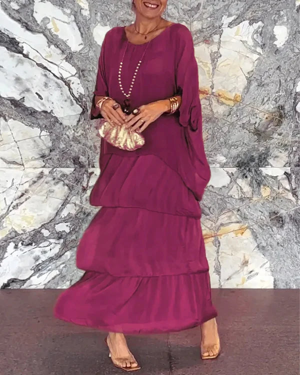 Elegantes Damen Chiffonkleid mit Lagenlook, fließend und figurbetont, ideal für festliche Anlässe und formelle Events.