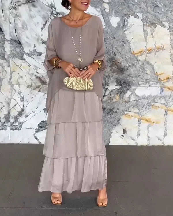 Elegantes Damen Chiffonkleid mit Lagenlook, fließend und figurbetont, ideal für festliche Anlässe und formelle Events.