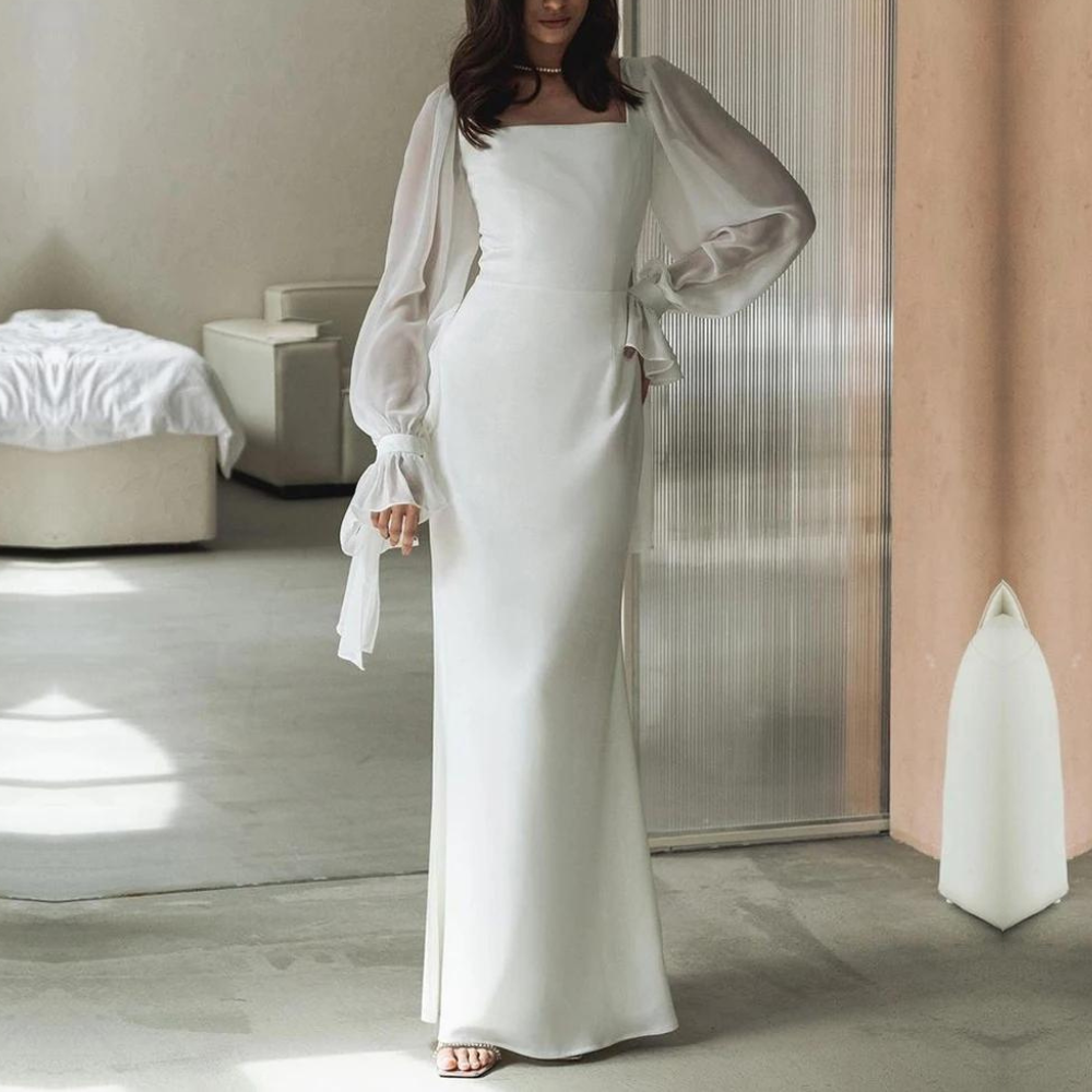 "Elegantes Damen-Maxikleid mit langen Ärmeln, bodenlang, figurbetont und mit ausgestellten Ärmeln, ideal für Hochzeiten."