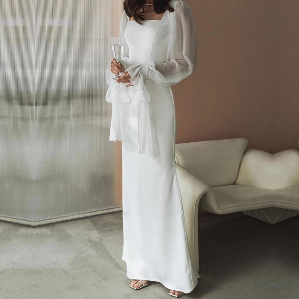 "Elegantes Damen-Maxikleid mit langen Ärmeln, bodenlang, figurbetont und mit ausgestellten Ärmeln, ideal für Hochzeiten."