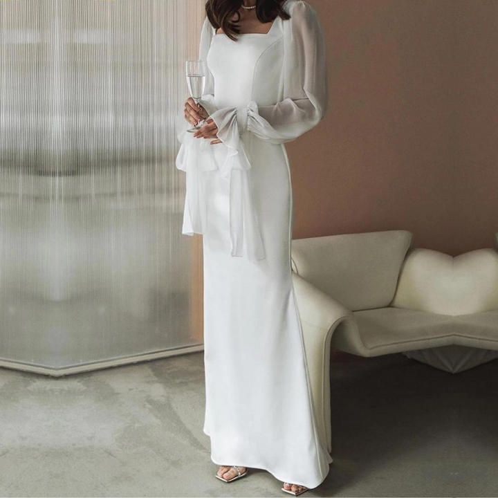 "Elegantes Damen-Maxikleid mit langen Ärmeln, bodenlang, figurbetont und mit ausgestellten Ärmeln, ideal für Hochzeiten."