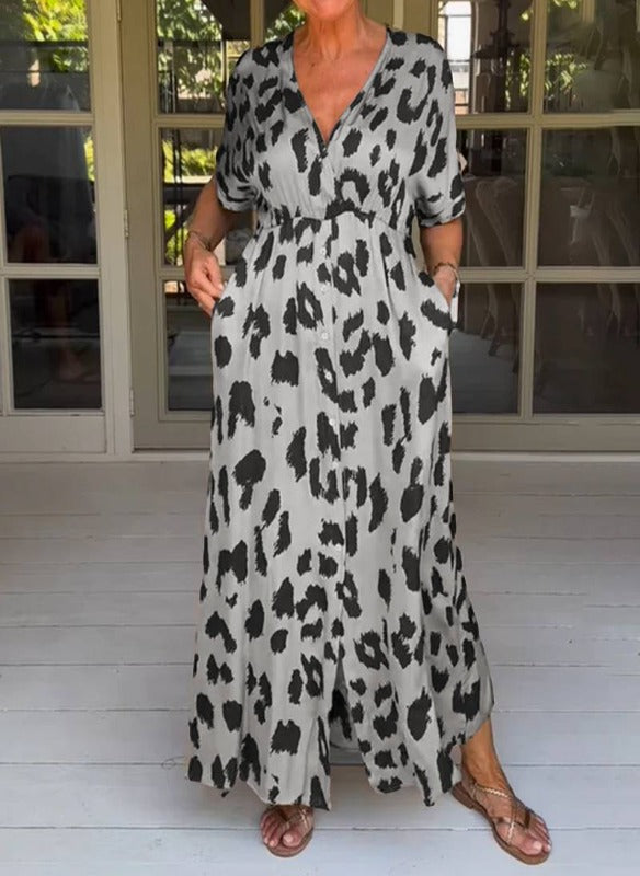 Elegantes Damen Maxikleid mit V-Ausschnitt und 3/4 Ärmeln, ideal für den Sommer; stilvoll und komfortabel.