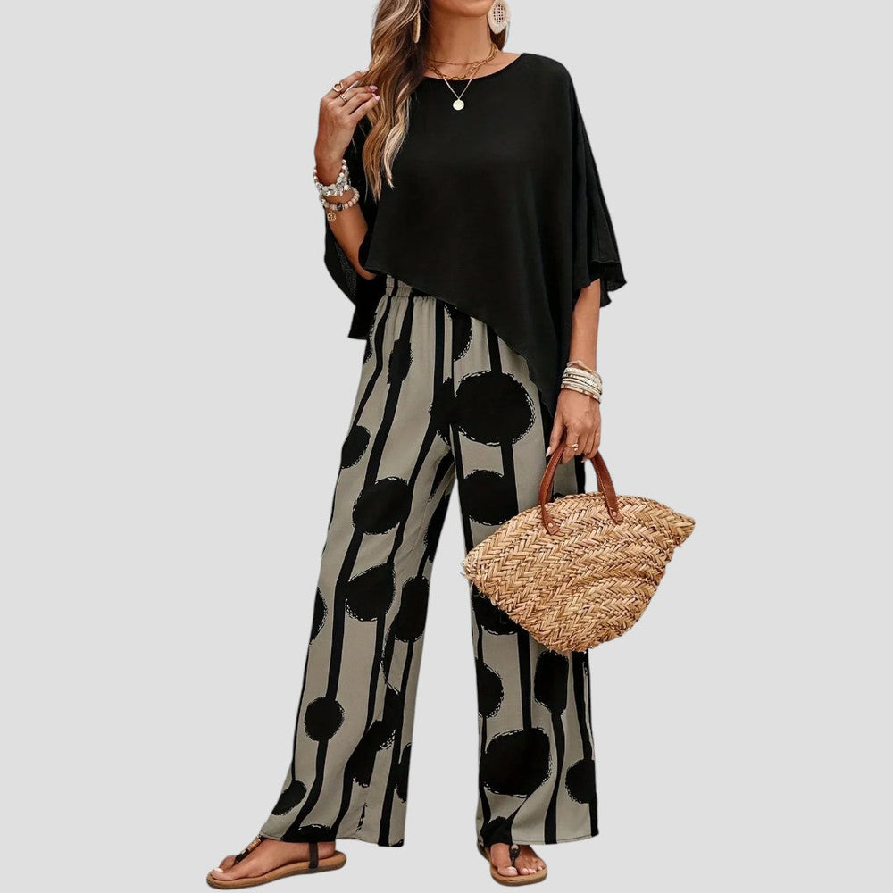 "Elegantes Damen-Set mit asymmetrischem Top und bedruckter Hose, modernes Muster, schmeichelhafter Schnitt, vielseitig tragba