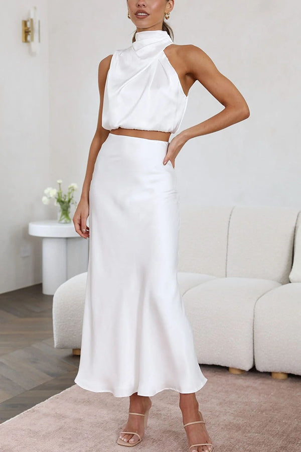 Elegantes Damen Set mit fließendem Maxirock und schickem Top in Cremeweiß für stilvolle Anlässe.