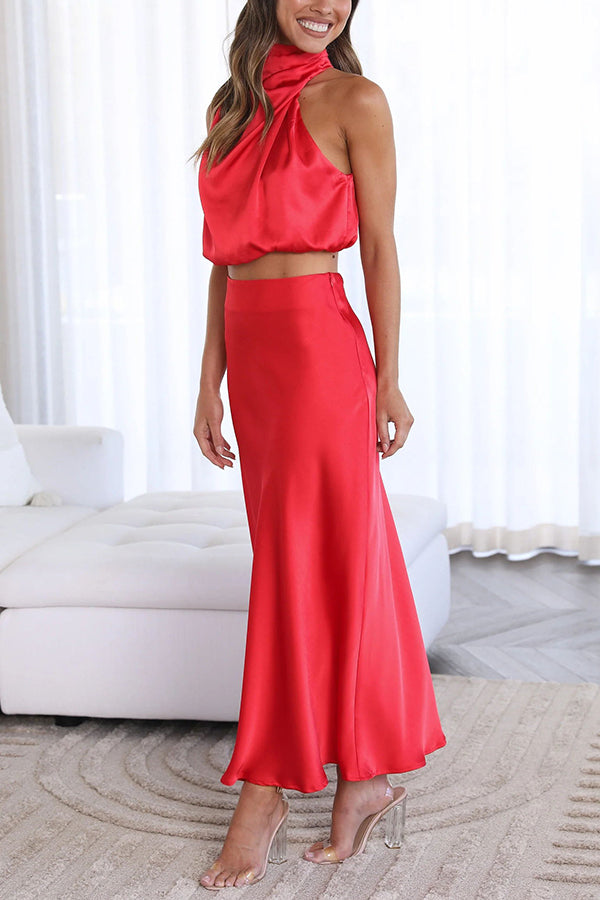 Elegantes Damen Set mit fließendem Maxirock und schickem Top in Cremeweiß für stilvolle Anlässe.