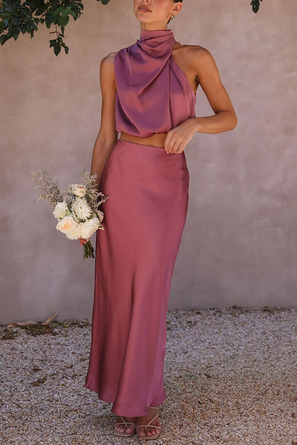 Elegantes Damen Set mit fließendem Maxirock und schickem Top in Cremeweiß für stilvolle Anlässe.