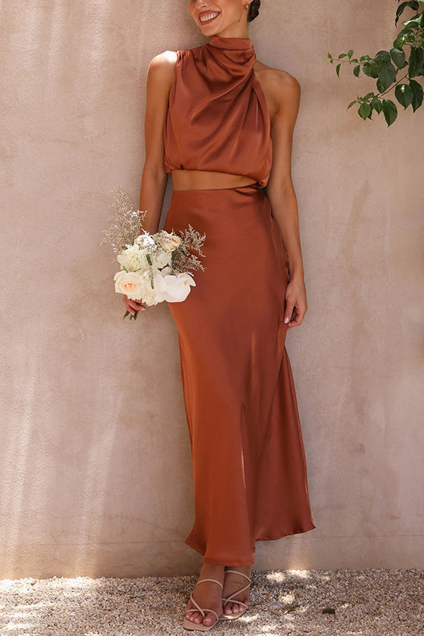 Elegantes Damen Set mit fließendem Maxirock und schickem Top in Cremeweiß für stilvolle Anlässe.
