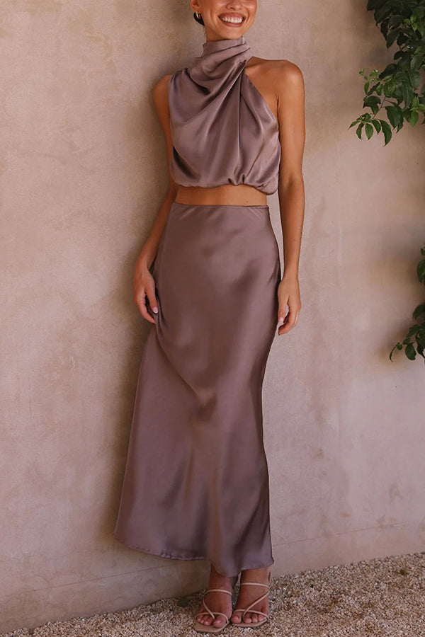 Elegantes Damen Set mit fließendem Maxirock und schickem Top in Cremeweiß für stilvolle Anlässe.
