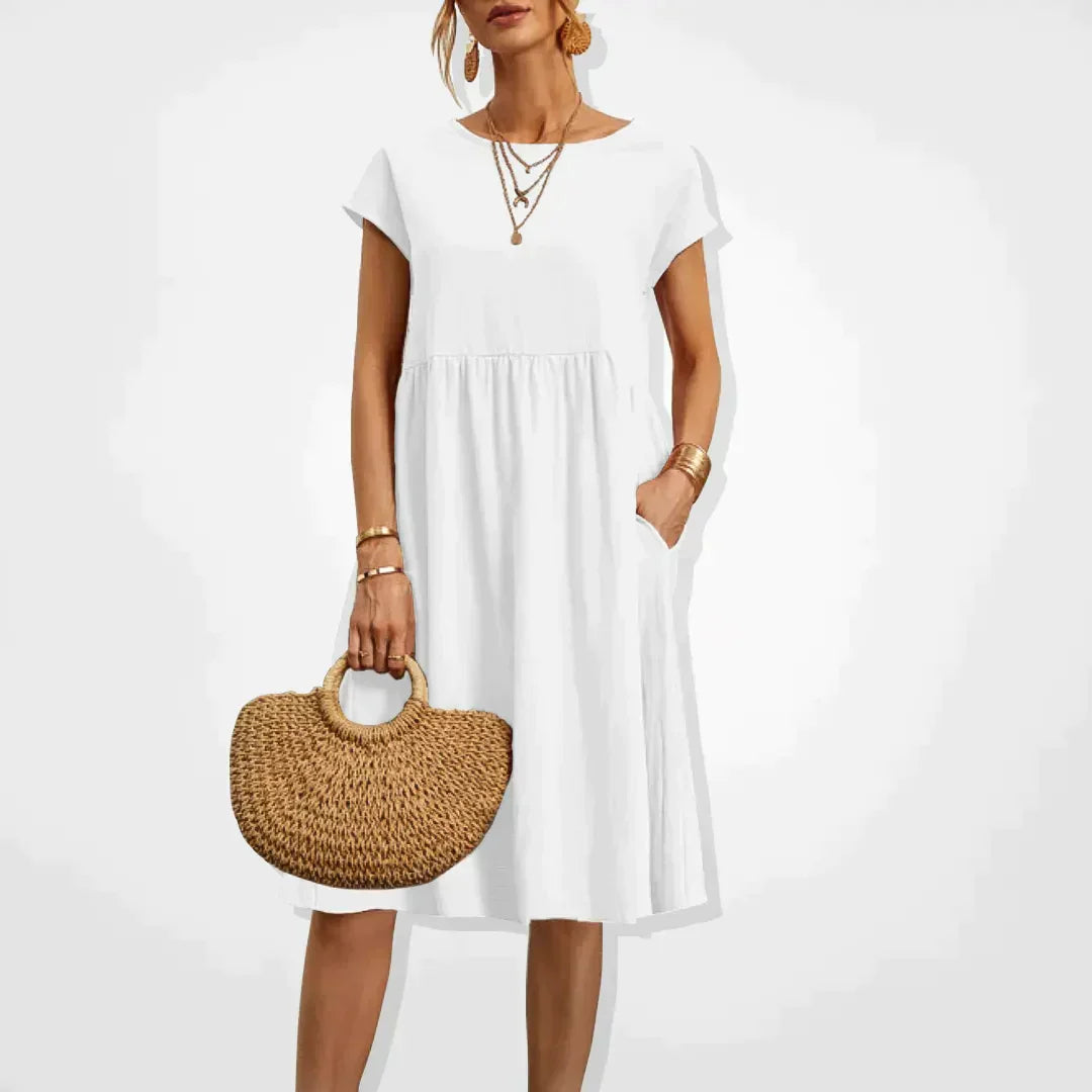 "Elegantes Damen-Sommerkleid mit Empire-Silhouette, kurze Ärmel, luftiger Rock, ideal für warme Tage, vielseitiger Stil."